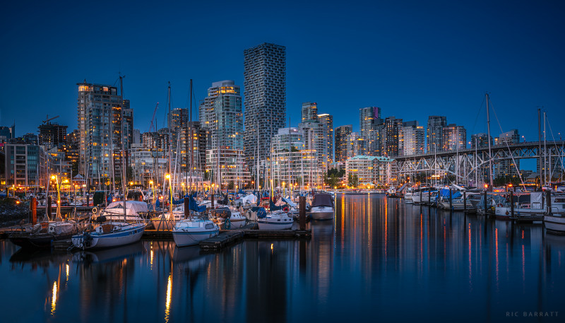 Cityscape of Downtown Vancouver's Fisherman's Wharf at dusk.
