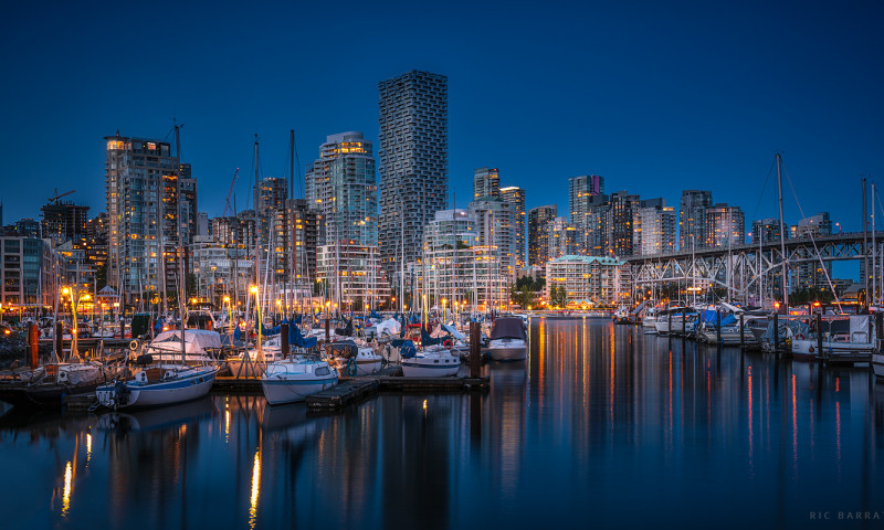 Cityscape of Downtown Vancouver's Fisherman's Wharf at dusk.