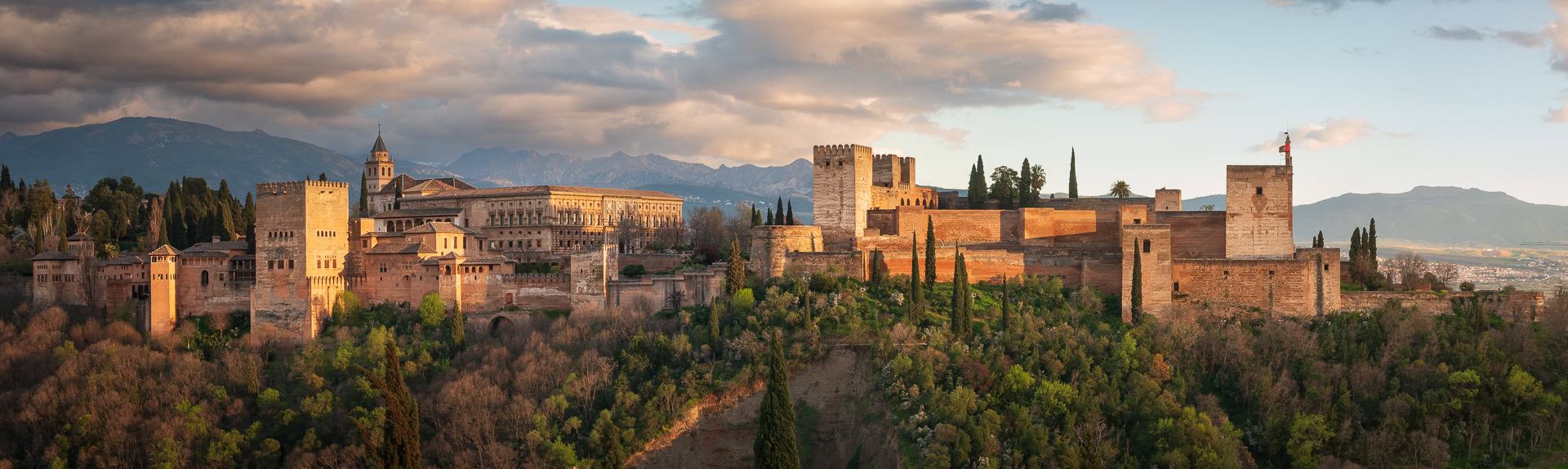 Panoramic view of the Alhambra Palace in Granada at sunset.